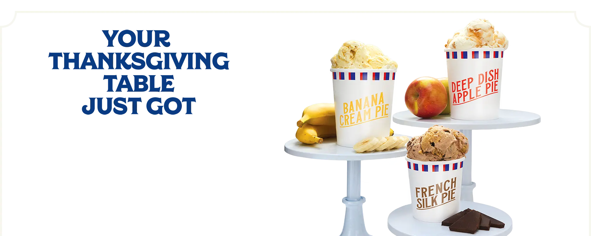 three quarts of Handel's ice cream sitting on cake trays